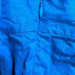 Skirt size 12. Aqua, pleated, side zip/closure.
